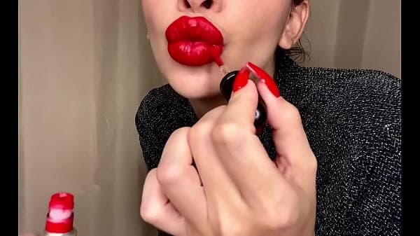 Oral com batom vermelho